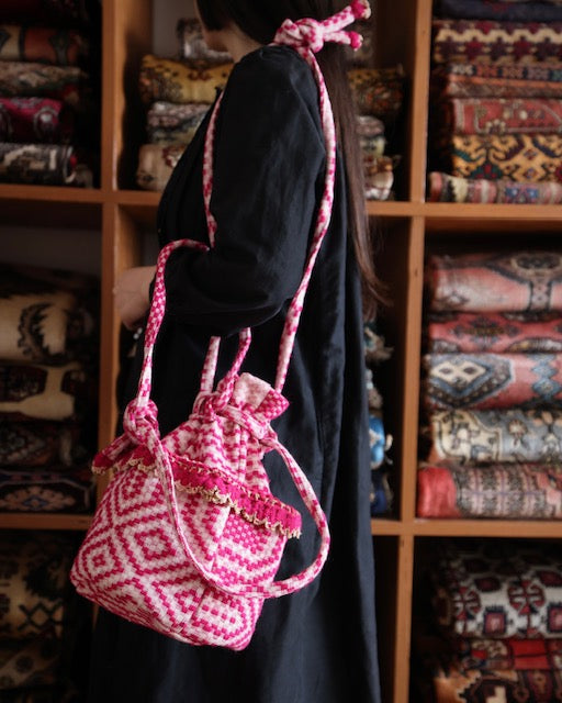 old coverlet pocket bag
