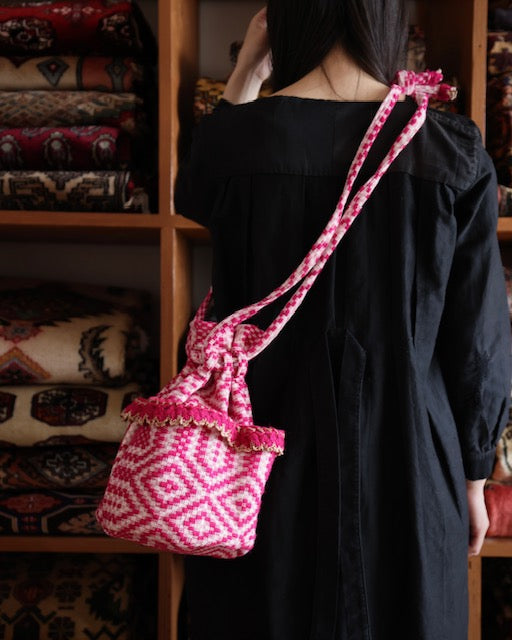 old coverlet pocket bag