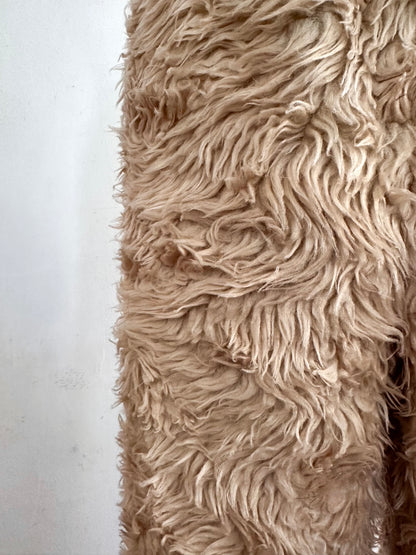 old fur pants /sand