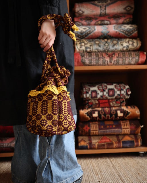 old coverlet pocket bag
