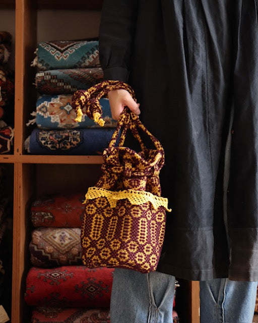 old coverlet pocket bag