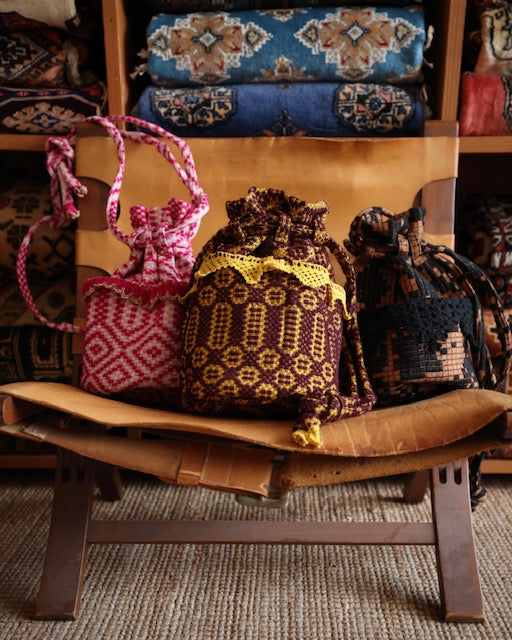 old coverlet pocket bag